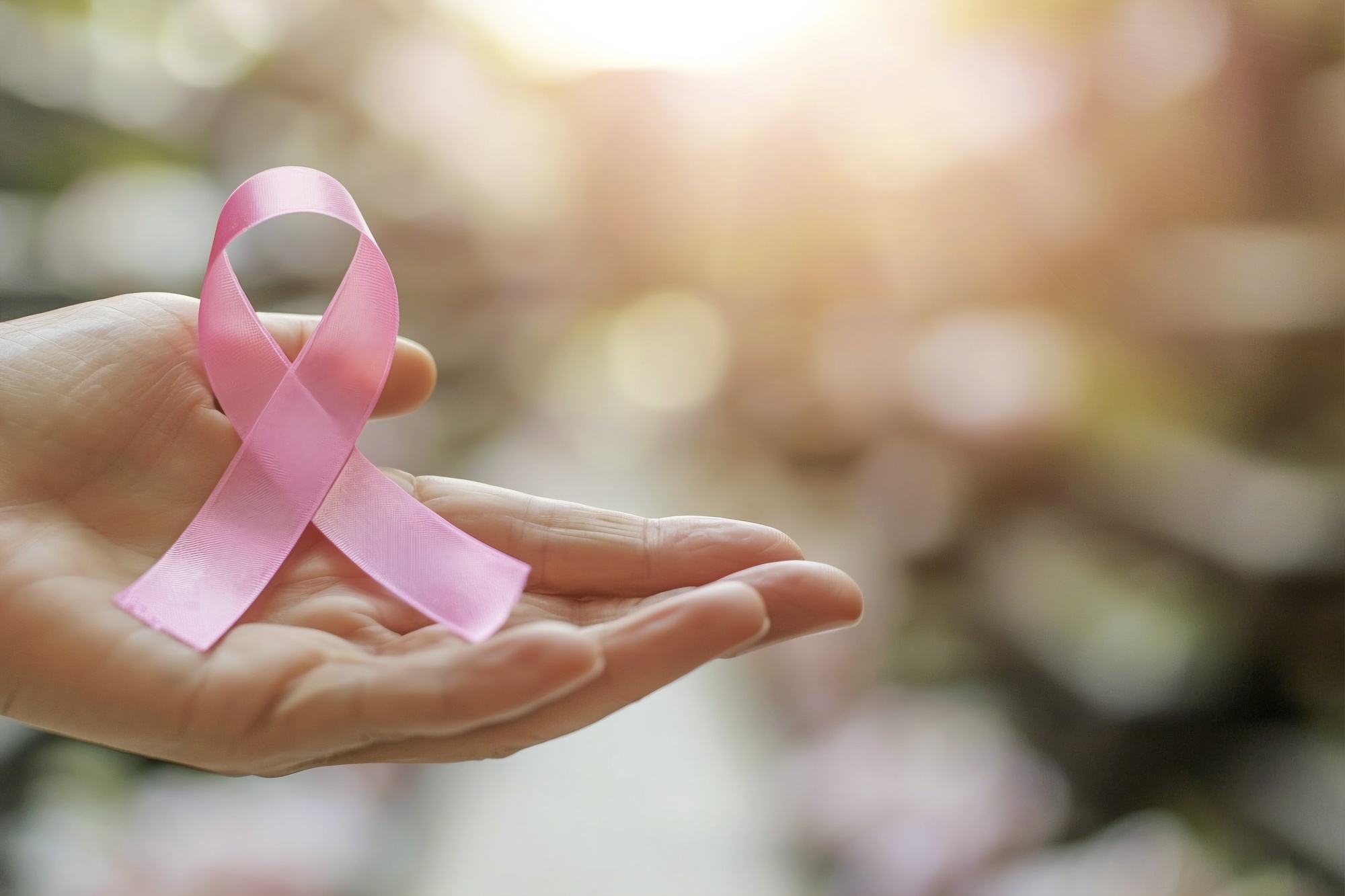 Breast cancer financial assistance ribbon